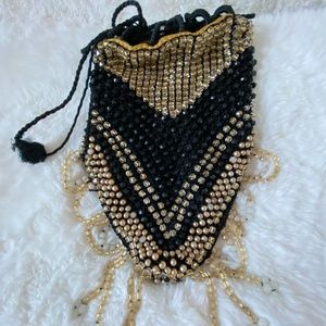 Fancy, yet sturdy vintage beaded evening wristlet